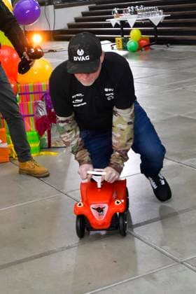 abb Joey Kelly musician athlete in the Bobbycar slide car in the RTL studio at the photo session for the 24 hour charity birthday challenge 30th birthday of the RTL charity marathon we help children at RTL Germany on 19 11 2025 in Cologne Deutz NRW Germany