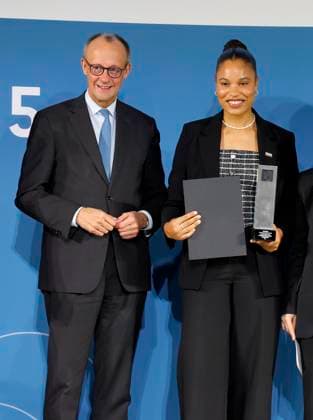 Patron Federal Chancellor Friedrich Merz, Yemisi Semechin shot putter at the TALISMAN 2025 award ceremony of the Deutschlandstiftung Integration at the Allianz Forum in Berlin