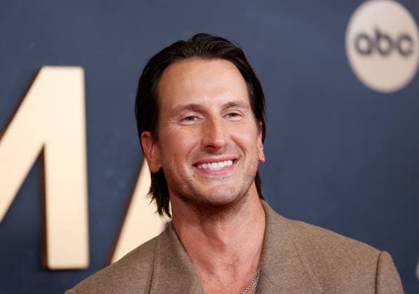 Russell Dickerson arrives on the red carpet for the 59th CMA Awards in Nashville, Tennessee, on Wednesday, November 19, 2025.  NAS20251119197 JOHNxANGELILLO