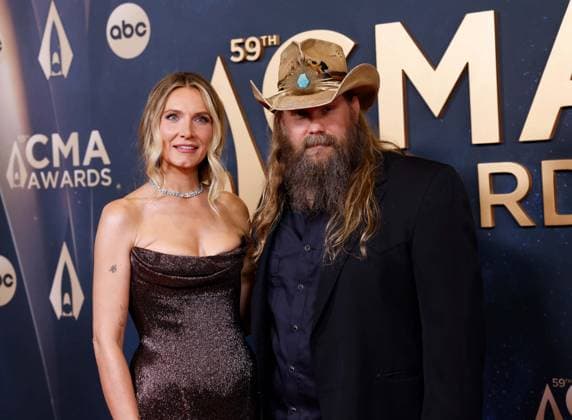 (L-R) Morgane Stapleton and Chris Stapleton arrive on the red carpet for the 59th CMA Awards in Nashville, Tennessee, on Wednesday, November 19, 2025.  NAS20251119253 JOHNxANGELILLO