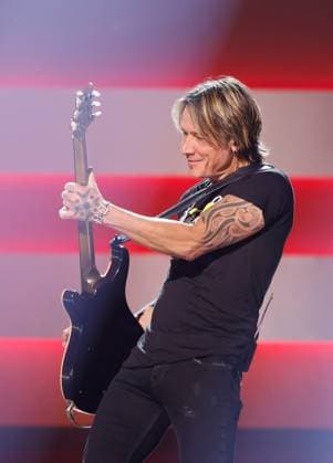 Keith Urban performs onstage during the 59th CMA Awards at the Bridgestone Arena in Nashville, Tennessee, on Wednesday, November 19, 2025.  NAS20251119287 JOHNxANGELILLO