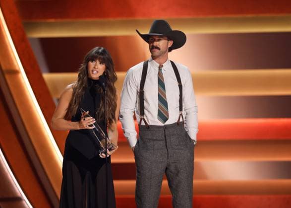 (L-R) Ella Langley and Riley Green accept the award for Song of the Year for you look like you love me onstage during the 59th CMA Awards at the Bridgestone Arena in Nashville, Tennessee, on Wednesday, November 19, 2025.  NAS20251119316 JOHNxANGELILLO