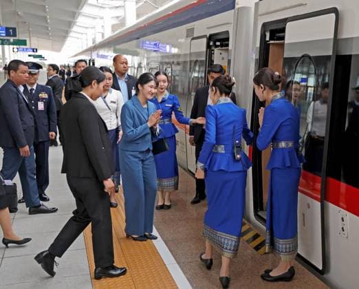 Japan Princess Aiko in Laos Japanese Princess Aiko (C) places her palms together before getting on a train at Vientiane station on her way to Luang Prabang, an ancient Lao capital, on the fourth day of her six-day official trip to Laos on Nov. 20, 2025. (Pool photo)  A14AA0005047988P