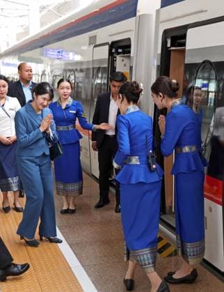 Japan Princess Aiko in Laos Japanese Princess Aiko places her palms together before getting on a train at Vientiane station on her way to Luang Prabang, an ancient Lao capital, on the fourth day of her six-day official trip to Laos on Nov. 20, 2025. (Pool photo)  A14AA0005047989P