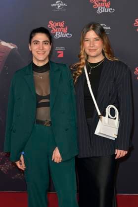 Melissa Bellissima with guest at the European premiere of the movie Song Sung Blue at Zoo Palast Berlin, 19 11 2025 Foto:xM.xBehrensx xFuturexImagex blue_5103