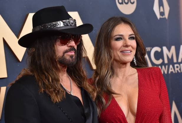 59th Annual CMA Awards - Arrivals Billy Ray Cyrus and Elizabeth Hurley arriving at the 59th Annual Country Music Association Awards held at the Bridgestone Arena on November 19, 2025 in Nashville, TN. Nashville Bridgestone Arena Tennessee USA Copyright: xOConnor-Arroyo AFF-USA.comx