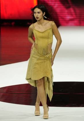 (251120) -- VANCOUVER, Nov. 20, 2025 -- A model presents a creation during the runway show at Vancouver Indigenous Fashion Week 2025 in Vancouver, British Columbia, Canada, Nov. 19, 2025. (Photo by Xinhua) CANADA-VANCOUVER-INDIGENOUS FASHION WEEK LiangxSen 