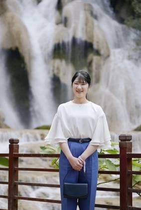 Japan Princess Aiko in Laos Japanese Princess Aiko poses for a photo in front of Kuang Si Falls in the ancient Lao capital of Luang Prabang during her official trip to Laos on Nov. 20, 2025. (Pool photo)  A14AA0005048798P