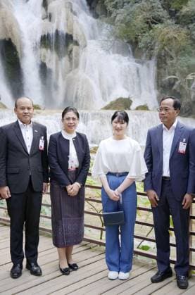 Japan Princess Aiko in Laos Japanese Princess Aiko (2nd from R) poses for a photo in front of Kuang Si Falls in the ancient Lao capital of Luang Prabang on Nov. 20, 2025.  A14AA0005048799P