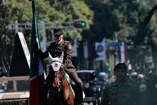 November 20, 2025, Mexico, Cdmx, Mexico: As part of the celebration of the 115th Anniversary of the Mexican Revolution, hundreds of soldiers dressed as charros and escaramuzas, in period attire, on horseback, and in a caravan of trucks adorned with giant sombreros, paraded down Avenida Juo¡rez for locals and visitors to enjoy the spectacle prepared by the Army, Navy, and National Guard. Mexico Mexico - ZUMAp204 20251120_zip_p204_032 Copyright: xJosuexPerezx