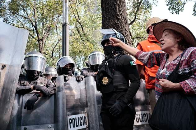 November 20, 2025, Mexico, Cdmx, Mexico: A group of approximately one hundred members of Generation Z, or Gen Z, marched down Paseo de la Reforma Avenue to protest the insecurity, corruption, and drug trafficking plaguing the country. They were intercepted by city police (riot police), who blocked their progress due to the ongoing military parade commemorating the anniversary of the Mexican Revolution. They were detained for a couple of hours until the police allowed them to proceed toward the Zo³calo, Mexico City s main square. However, the police again blocked their path one block before they reached the Plaza de la Constitucio³n. The protest was peaceful, with members of the Black Bloc once again using the One Piece flag, a Japanese - ZUMAp204 20251120_zip_p204_012 Copyright: xJosuexPerezx