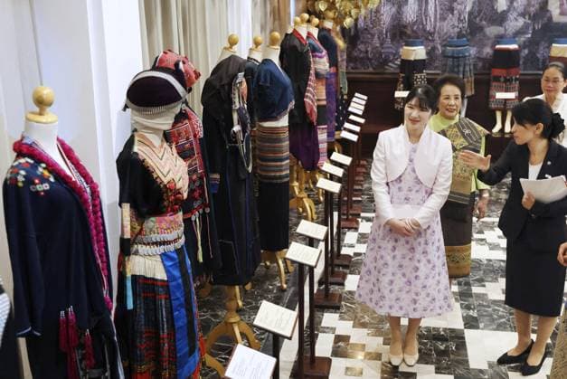 Japan Princess Aiko in Laos Japanese Princess Aiko (front, L) visits an exhibition of traditional dresses in Vientiane on Nov. 21, 2025, during her official trip to Laos. (Pool photo)  A14AA0005051880P