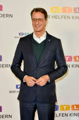 ABB Hendrik Josef Wüst Wuest CDU politician with Wolfram Kons Moderator State Premier of North Rhine-Westphalia North Rhine-Westphalia on the red carpet in the RTL studio at the charity for the 30th anniversary of the RTL Spendenmarathon wir helfen Kindern bei RTL Deutschland on 21 11 2025 2 Donation Day in Cologne Deutz NRW Germany