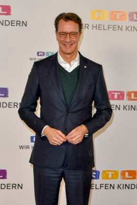 ABB Hendrik Josef Wüst Wuest CDU politician with Wolfram Kons Moderator State Premier of North Rhine-Westphalia North Rhine-Westphalia on the red carpet in the RTL studio at the charity for the 30th anniversary of the RTL Spendenmarathon wir helfen Kindern bei RTL Deutschland on 21 11 2025 2 Donation Day in Cologne Deutz NRW Germany