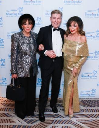 November 22, 2025, London, United Kingdom: Andrew Pierce (centre) and Dame Joan Collins (right) seen attending the Shooting Star Ball in aid of Shooting Star Children s Hospices at the Royal Lancaster Hotel. London United Kingdom - ZUMAs197 20251122_aaa_s197_289 Copyright: xBrettxCovex