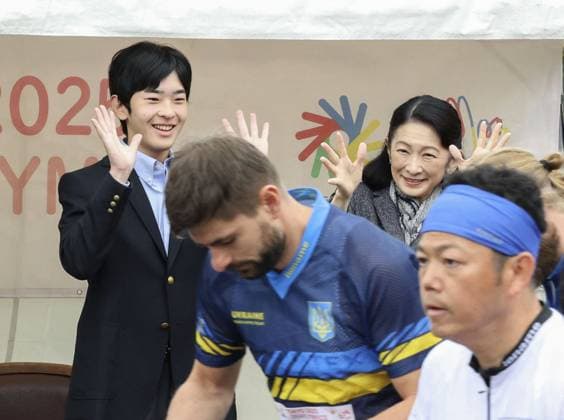 Crown princess, prince visit Izu Oshima Island Japanese Crown Princess Kiko and her son Prince Hisahito (back, L) watch Tokyo Deaflympics orienteering during a visit to Izu Oshima Island in the Pacific about 100 kilometers south of Tokyo on Nov. 23, 2025. (Pool photo)  A14AA0005057048P
