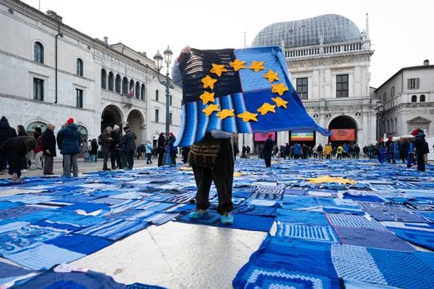 November 23, 2025: November 23, Brescia, Italy Viva Vittoria demostration Tutti in trap a project by the Spedali Civili di Brescia to prevent youth addictions a woman shows off one of the blankets for sale, the proceeds of which will go to the youth addiction center - ZUMAb205 20251123_zip_b205_005 Copyright: xMatteoxBiattax