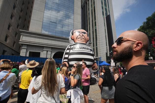 Crowds celebrate Bolsonaro’s arrest with BBQ & Samba gathering in Sao Paulo SAO PAULO, BRAZIL - NOVEMBER 23: Demonstrators gather along Avenida Paulista for the BBQ & Samba event celebrating the recent arrest of former Brazilian President Jair Bolsonaro, in front of the MASP museum in Sao Paulo, Brazil, on November 23, 2025. The gathering featured music, samba performances and communal festivities, which participants described as a symbolic milestone for Brazilian democracy. Ratib Al Safadi Anadolu Sao Paulo Brazil. Editorial use only. Please get in touch for any other usage.  Copyright: x2025xAnadoluxRatibxAlxSafadix