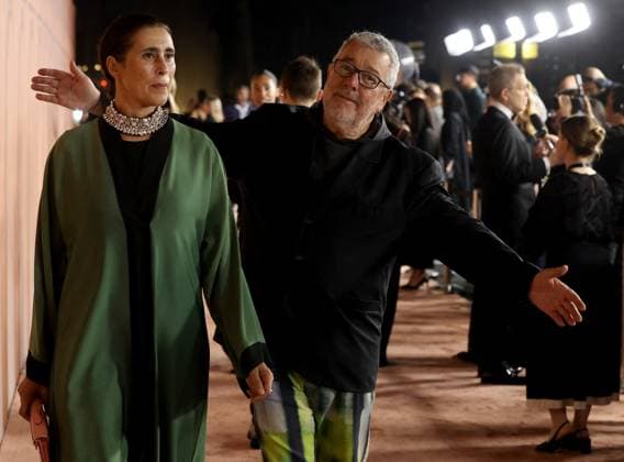 Celebs Attend Inaugural Franca Fund Gala - Doha French industrial architect and designer, Philippe Starck and his wife Jasmine Abdellatif arrive on the red carpet of the inaugural Franca Fund Gala held on November 23, 2025 at the Museum of Islamic Art in Doha, Qatar. Photo by Balkis Press ABACAPRESS.COM Doha United Arab Emirates  Copyright: xBalkisxPress ABACAx