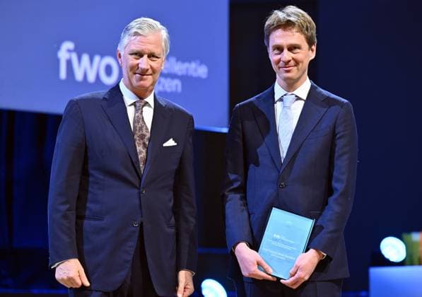 King Philippe - Filip of Belgium and Professor Francois-Xavier Standaert of UCLouvain pictured during the award ceremony of the five-year Scientific Excellence Awards awarded by the Fund for Scientific Research (FWO - FRS - FNRS), at Bozar in Brussels on Monday 24 November 2025.  ERICxLALMAND 143890440