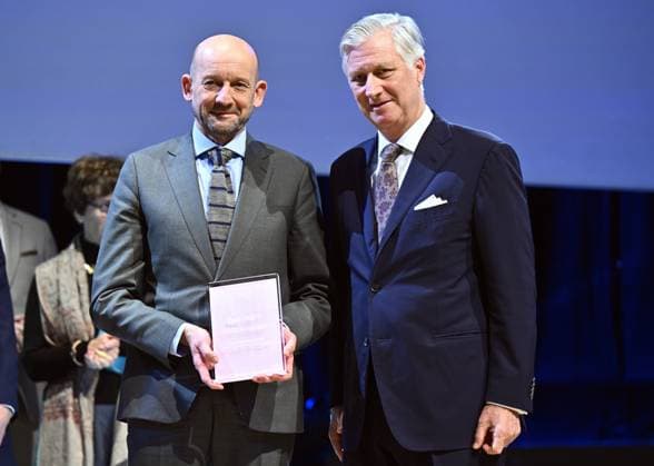 Professor Frederic Amant of KU Leuven and King Philippe - Filip of Belgium pictured during the award ceremony of the five-year Scientific Excellence Awards awarded by the Fund for Scientific Research (FWO - FRS - FNRS), at Bozar in Brussels on Monday 24 November 2025.  ERICxLALMAND 143890519