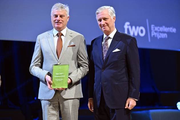 Professor Johan Neyts of KU Leuven and King Philippe - Filip of Belgium pictured during the award ceremony of the five-year Scientific Excellence Awards awarded by the Fund for Scientific Research (FWO - FRS - FNRS), at Bozar in Brussels on Monday 24 November 2025.  ERICxLALMAND 143890525