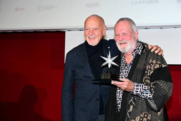 43rd Turin Film Festival 2025, Day 3 - Awarding of the Mole Stella to Terry Gilliam. Pictured: Enzo Ghigo, Terry Gilliam  Copyright: xMaurizioxD Avanzox xipa-agency.netx xDxAvanzo xMangiarottix IPA_Agency_IPA68346930