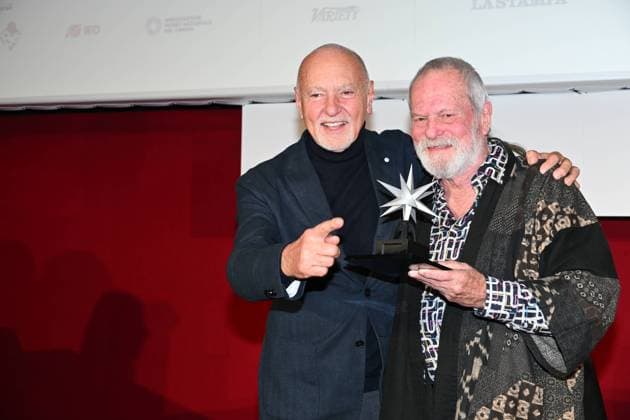 43rd Turin Film Festival 2025, Day 3 - Awarding of the Mole Stella to Terry Gilliam. Pictured: Enzo Ghigo, Terry Gilliam  Copyright: xMaurizioxD Avanzox xipa-agency.netx xDxAvanzo xMangiarottix IPA_Agency_IPA68346932