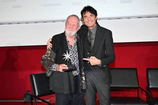 43rd Turin Film Festival 2025, Day 3 - Award ceremony of the Mole Stella to Terry Gilliam. In the photo: Terry Gilliam, Giulio Base  Copyright: xMaurizioxD Avanzox xipa-agency.netx xDxAvanzo xMangiarottix IPA_Agency_IPA68346940