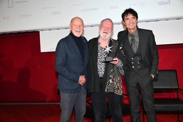 43rd Turin Film Festival 2025, Day 3 - Awarding of the Mole Stella to Terry Gilliam. Pictured: Enzo Ghigo, Terry Gilliam, Giulio Base  Copyright: xMaurizioxD Avanzox xipa-agency.netx xDxAvanzo xMangiarottix IPA_Agency_IPA68346943