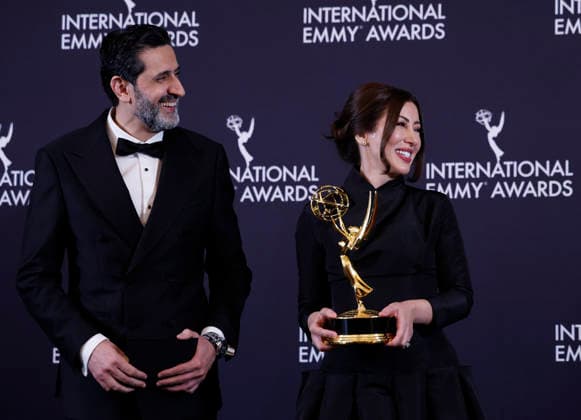 Algerian journalist Fairouz Ziani and Palestinian journalist Asef Hamidi arrive in the press room with the News award for Gaza at the 53rd International Emmy Awards at New York Hilton Midtown in New York City on Monday, November 24, 2025.  NYP20251124272 JohnxAngelillo