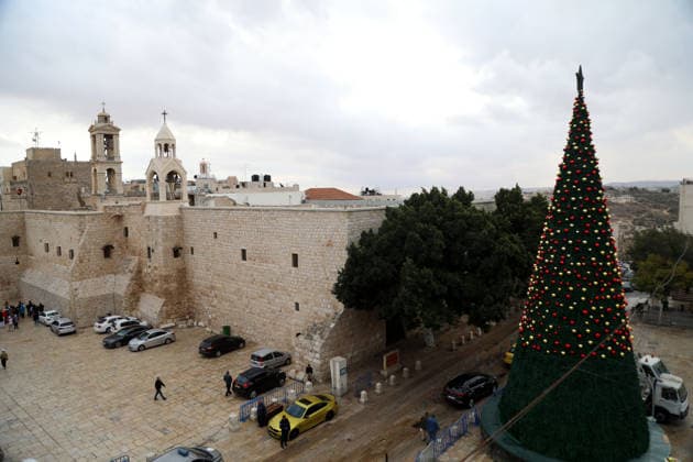 Christmas preparations in Bethlehem BETHLEHEM, WEST BANK - NOVEMBER 25: A view of a giant Christmas tree, placed in the square of the Church of the Nativity for Christmas in Bethlehem, West Bank on November 25, 2025. Wisam Hashlamoun Anadolu Bethlehem West Bank. Editorial use only. Please get in touch for any other usage.  Copyright: x2025xAnadoluxWisamxHashlamounx