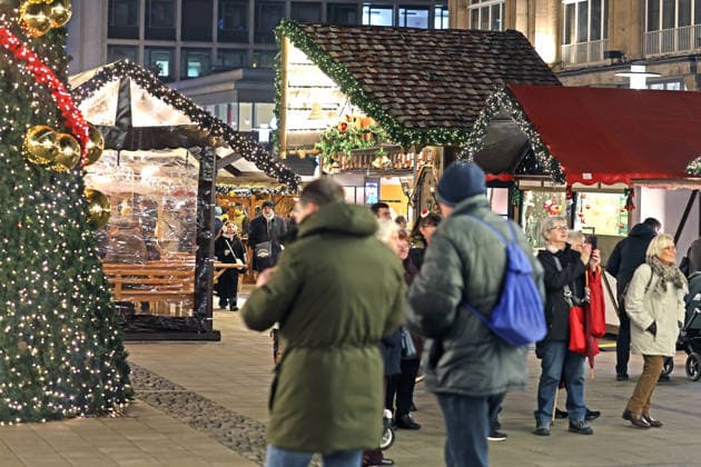 Christmas market in the heart of the Ruhr area The international Christmas market in Essen with magical stalls and lights Essen North Rhine-Westphalia Germany Willy Brandt Platz