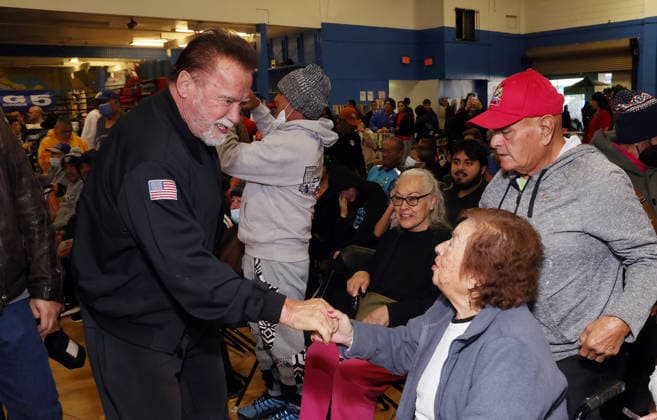 25 November 2025 - Los Angeles, California - Governor Arnold Schwarzenegger. 44th Annual Miracle on 1st Street Turkey Giveaway! held at The Hollenbeck Youth Center. Photo Copyright: xAdMediax MediaPunchx