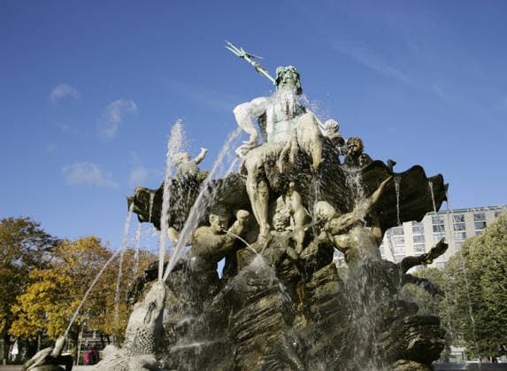 Berlin, Germany. Neptune Fountain (Neptunbrunnen). Detail. Berlin, Germany. Neptune Fountain (Neptunbrunnen). Designed by Reinhold Begas (1831-1911) and inaugurated in 1891, the fountain was moved from its original location at the Schlossplatz in 1951 when the former Berliner Schloss (Berlin Palace) there was demolished. After being restored, it was moved in 1969 to its present location between St. Mary s Church (Marienkirche) and the Red Town Hall (Rotes Rathaus). The Roman god Neptune is in the center. The four women around him represent the four main rivers of Prussia at the time of its construction: Elbe, Rhine, Vistula and Oder. Detail. Berlin Germany  Copyright: xKenaxImagesx 353-45667