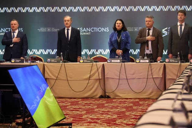 EU Sanctions Envoy David O’Sullivan (2nd L), Ambassador of the EU to Ukraine Katarina Mathernova (C) and First Deputy Minister of Foreign Affairs of Ukraine Sergiy Kyslytsya (2nd R) stand to attention during the sounding of the Ukrainian anthem during the Sanctions Summit in Kyiv, Ukraine, November 27, 2025. The summit convenes over 60 sanctions policy officials from the European Union, the United States, and Canada. Discussions focus on critical issues, including the shadow fleet, energy, financial restrictions, sanctions circumvention, and the operations of Russia’s military-industrial complex. (Photo by Pavlo Bahmut Ukrinform) Inaugural Sanctions Summit underway in Kyiv Copyright: xPavloxBahmutx