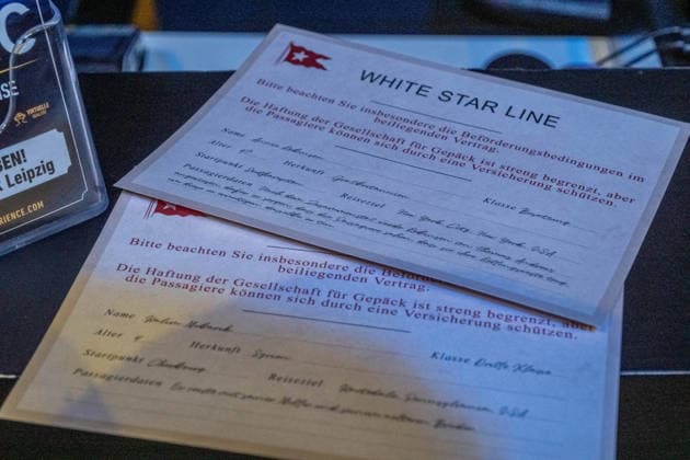 The exhibition Titanic An Immersive Voyage opens its doors in Leipzig on November 28 Original artifacts from the RMS Titanic and its sister ship Olympic as well as elaborately staged film props from James Camerons Titanic are on display Highlights include a rare deck chair from the promenade deck of the Titanic ocean liner that crashed in 1912 E