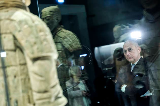 (251128) -- BUDAPEST, Nov. 28, 2025 -- A visitor views exhibits at the exhibition Civilization of the Qin and Han Dynasties - The First Chinese Emperor s Terracotta Warriors at the Museum of Fine Arts in Budapest, Hungary, Nov. 27, 2025. The Museum of Fine Arts in Budapest on Thursday opened one of the most significant Chinese cultural exhibitions ever held in Hungary, presenting more than 150 ancient artworks from the Qin and Han dynasties (221 BC-220 AD), including ten original Terracotta Warriors. Titled Civilization of the Qin and Han Dynasties - The First Chinese Emperor s Terracotta Warriors, the exhibition is jointly organized by the Museum of Fine Arts in Budapest and the Shaanxi Provincial Cultural Heritage Administration, 