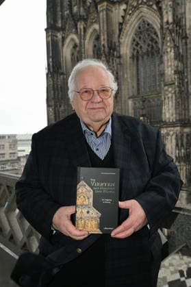 Author Prof Dr Theol Manfred Becker Huberti poses at the launch of his new book Vom Vierten der Heiligen Drei Könige (The Fourth of the Magi)