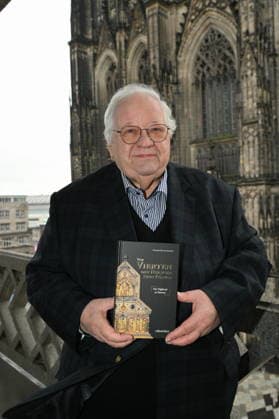 Author Prof Dr Theol Manfred Becker Huberti poses at the launch of his new book Vom Vierten der Heiligen Drei Könige (The Fourth of the Magi)
