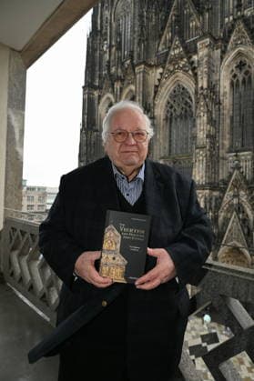 Author Prof Dr Theol Manfred Becker Huberti poses at the launch of his new book Vom Vierten der Heiligen Drei Könige (The Fourth of the Magi)