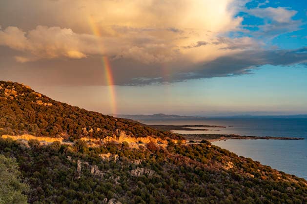 Rainbow Rainbow over the South West coast of Corsica, France Rainbow over the South West coast of Corsica, France
