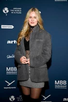 ABBberlin Lara Sophie Hoegler on the red carpet at the festival opening AROUND THE WORLD IN 14 FILMS at Cinestar Kino in der Kulturbrauerei Berlin on 28 11 2025 Berlin Germany