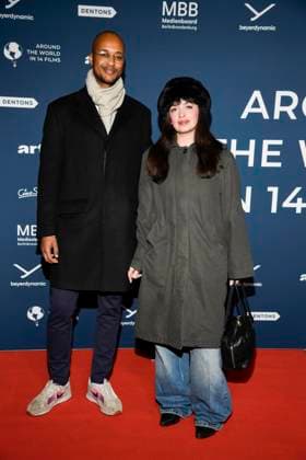 ABBberlin Nellie Thalbach actress with her husband on the red carpet at the festival opening AROUND THE WORLD IN 14 FILMS at Cinestar Kino in der Kulturbrauerei Berlin on 28 11 2025 Berlin Germany