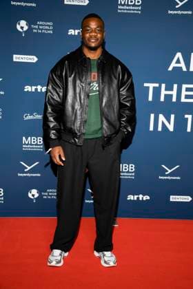 ABBberlin Melo Nsuka on the red carpet at the festival opening AROUND THE WORLD IN 14 FILMS at Cinestar Kino in der Kulturbrauerei Berlin on 28 11 2025 Berlin Germany