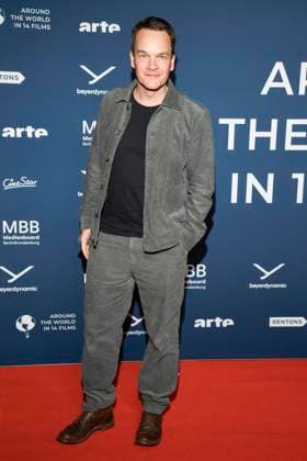 ABBberlin Ludwig Blochberger actor as guest on the red carpet at the festival opening AROUND THE WORLD IN 14 FILMS at Cinestar Kino in der Kulturbrauerei Berlin on 28 11 2025 Berlin Germany