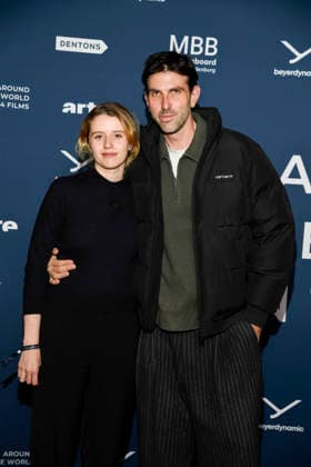 ABBberlin Katharina Stark and Fabian Stumm as guests on the red carpet at the festival opening AROUND THE WORLD IN 14 FILMS at Cinestar Kino in der Kulturbrauerei Berlin on 28 11 2025 Berlin Germany