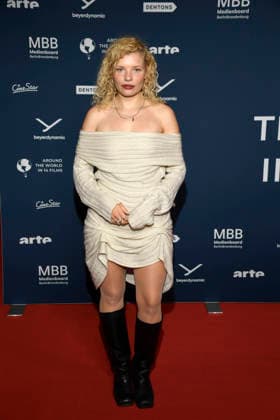 ABBberlin Luisa Celine Gaffron German actress on the red carpet at the festival opening AROUND THE WORLD IN 14 FILMS at Cinestar Kino in der Kulturbrauerei Berlin on 28 11 2025 Berlin Germany