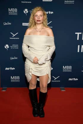 ABBberlin Luisa Celine Gaffron German actress on the red carpet at the festival opening AROUND THE WORLD IN 14 FILMS at Cinestar Kino in der Kulturbrauerei Berlin on 28 11 2025 Berlin Germany