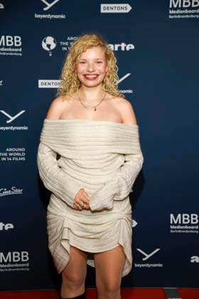 ABBberlin Luisa Celine Gaffron German actress on the red carpet at the festival opening AROUND THE WORLD IN 14 FILMS at Cinestar Kino in der Kulturbrauerei Berlin on 28 11 2025 Berlin Germany